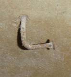 floor bent nail in wall tw