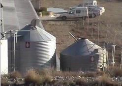 Feed open bin lids